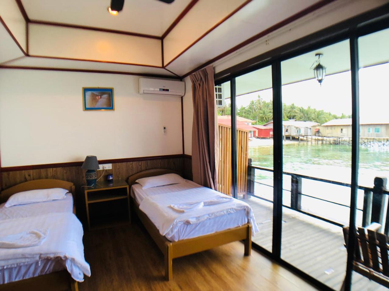 Mabul Paradise Lodge Mabul Island Bagian luar foto